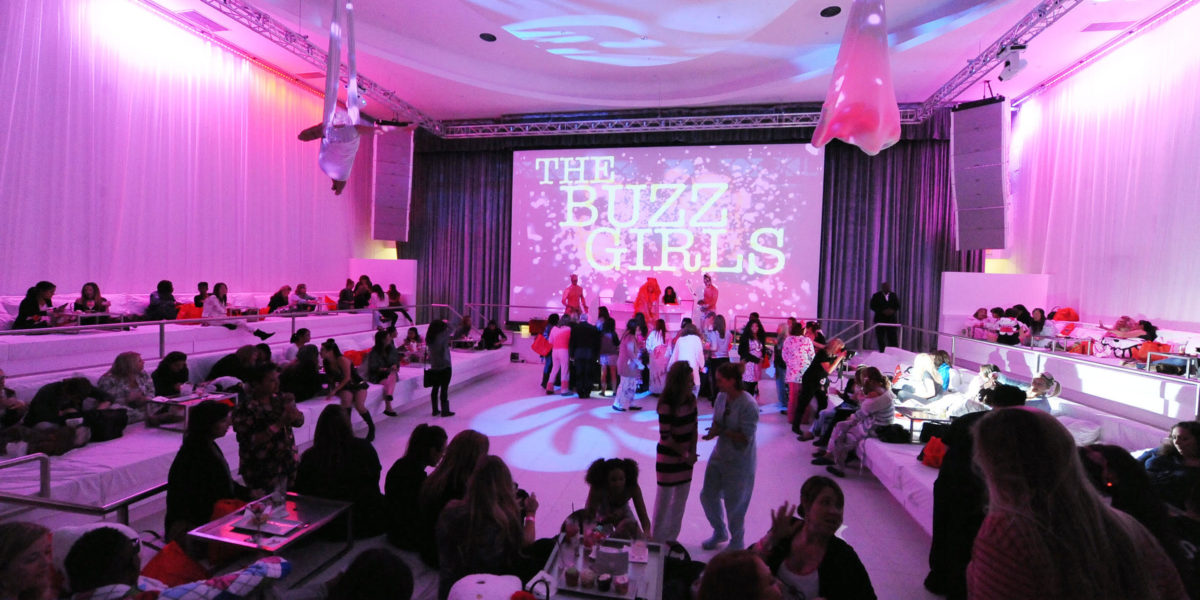 Empowered women celebrating The Buzz Girls